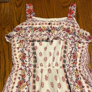 Girls size 12 dress. Elastic waist, button and ruffle detail, lined. Worn once.